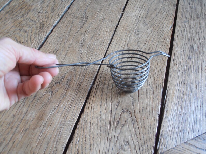 A French vintage wire egg cooker