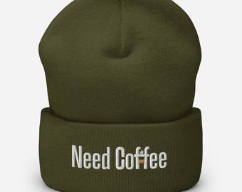 May include: A dark green beanie with a white embroidered design that says "Need Coffee" with a small coffee cup icon.