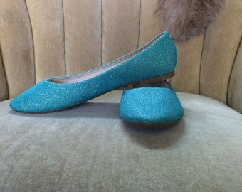 teal blue flats