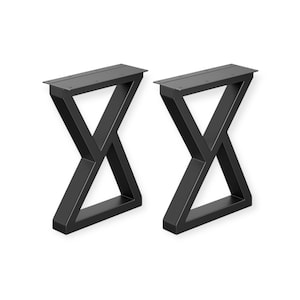 May include: Two black metal table legs with an X-shaped design. Each leg has a rectangular top with pre-drilled holes for mounting and a solid base. The legs are made of a sturdy metal and are suitable for various table projects.