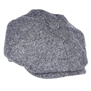 May include: A grey wool newsboy cap with a classic eight-panel design.