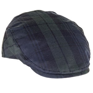 May include: A navy blue and green plaid newsboy cap with a curved brim.
