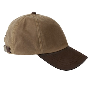 May include: A brown and tan baseball cap with a brown leather brim. The cap has a buckle on the side.