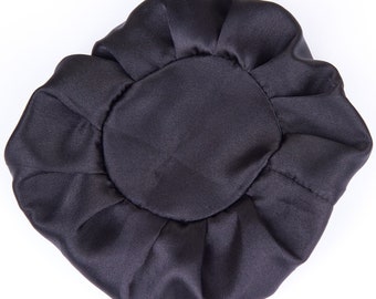 May include: A black satin sleep cap with a gathered design.