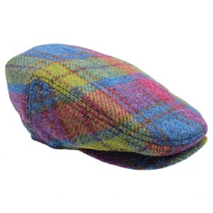 May include: A colourful plaid wool flat cap with a blue, green, pink and yellow pattern.
