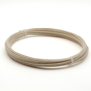 May include: A coil of off-white, thin, braided cord.