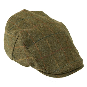 May include: A green tweed flat cap with a checkered pattern in shades of brown, red, and blue.