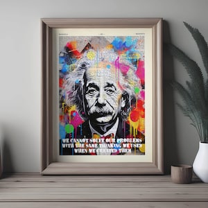 Puede incluir: Una impresi&oacute;n de arte abstracto colorida con un retrato en blanco y negro de Albert Einstein con la cita "No podemos resolver nuestros problemas con el mismo pensamiento que usamos cuando los creamos."