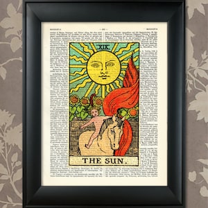 May include: The Sun tarot card from the Rider-Waite deck. The card features a yellow sun with a face, a child riding a white horse, and sunflowers in the background. The card is surrounded by text in a vintage style.