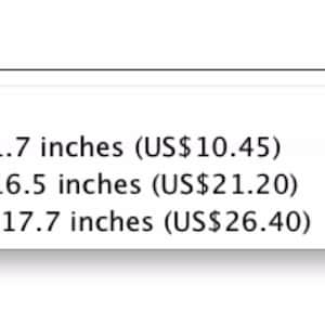May include: A dropdown menu with the text "Select a size" and options for different sizes of matte and satin paper, including A4 Matte 8.3x11.7 inches (US$10.45), A3 Matte 11.7x16.5 inches (US$21.20), and A3+ Satin 12.6x17.7 inches (US$26.40).