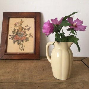 Old ceramic milk pot