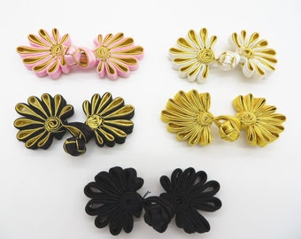 2 sets of hand-stitched frog fasteners trims, choice of colours with gold.