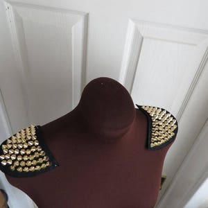 1 Pair of shoulder patch trims / epaulettes black with gold spikes