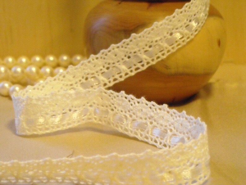 hem trim 1m off white or Black ribbon diamante edging
