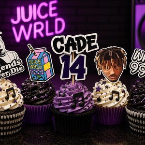 May include: Five cupcakes with black and white paper liners, topped with purple and white frosting, black sprinkles, and music note decorations. Each cupcake features a custom topper including Juice WRLD imagery, the text CADE 14, and 999.