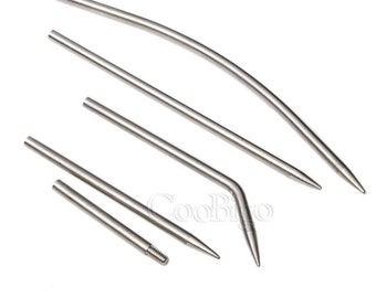 May include: A collection of silver-colored metal knitting needles in various shapes and sizes. The needles are straight, curved, and angled, with pointed tips. The brand name "CooBigo" is visible in the upper left corner.