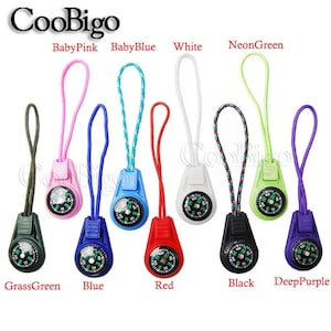 May include: Assortment of ten zipper pulls with built-in compasses. The pulls are available in ten colors: baby pink, baby blue, white, neon green, grass green, blue, red, black, and deep purple.