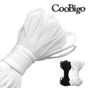 May include: A large spool of white elastic cord, perfect for crafting and DIY projects. The cord is soft and stretchy, making it ideal for making face masks, hair ties, and other accessories. CooBigo is printed on the image.