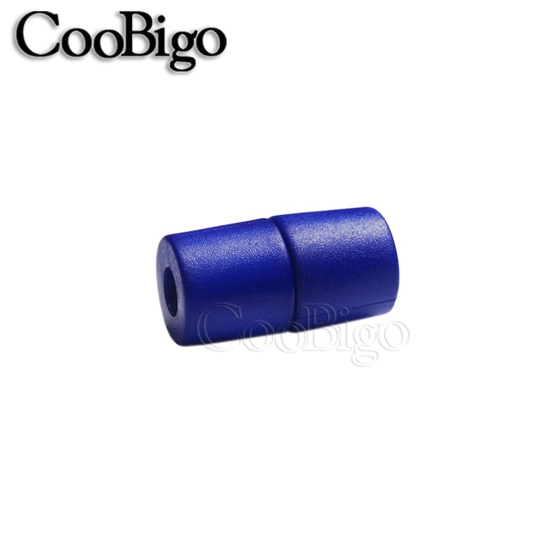 May include: A close-up of a blue plastic cord end stop. The end stop is designed to prevent cords from fraying.