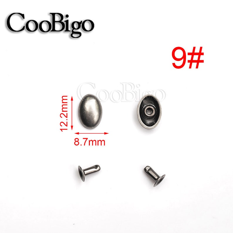May include: Silver oval-shaped metal rivets with a 9# size designation. The rivets are 12.2 mm long and 8.7 mm wide. The rivets are shown with their corresponding posts.