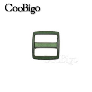 May include: A dark green plastic buckle with two horizontal slots. The buckle is square shaped and has a matte finish.