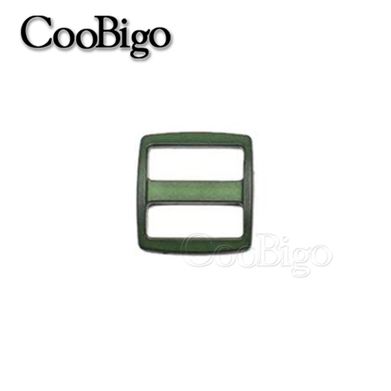 May include: A dark green plastic buckle with two horizontal slots. The buckle is square shaped and has a matte finish.