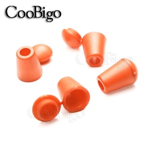 May include: Six orange plastic cord end stoppers. The stoppers are designed to fit over the end of a cord or rope to prevent fraying. The stoppers have a small hole in the top for threading a cord through.
