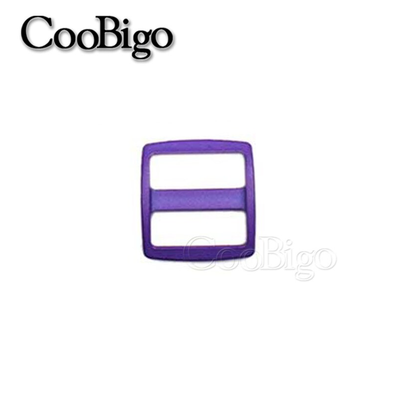 May include: Purple plastic slider buckle with two horizontal bars.