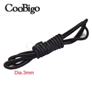 May include: Black elastic cord, 3 mm in diameter, coiled and ready to use. CooBigo.