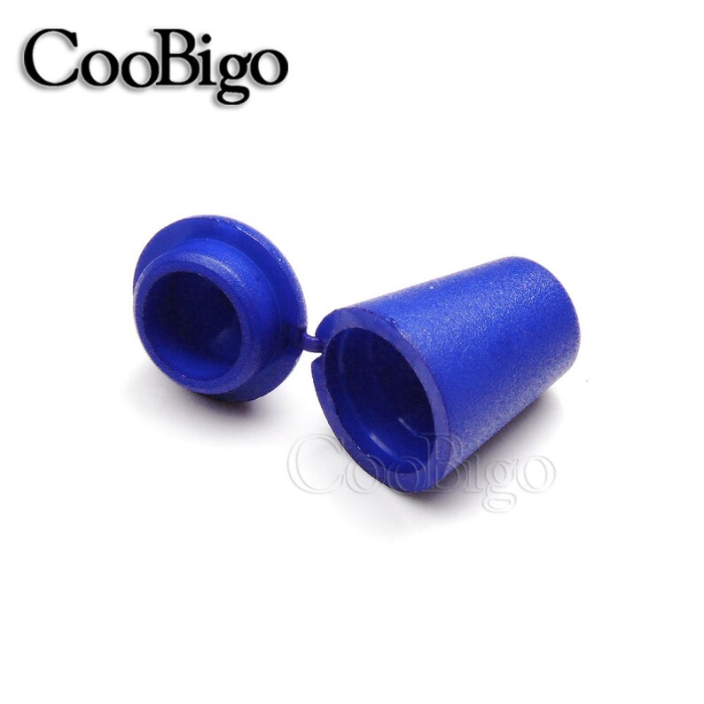 May include: A blue plastic cap with a hinged lid. The cap is designed to cover the end of a cable or wire.