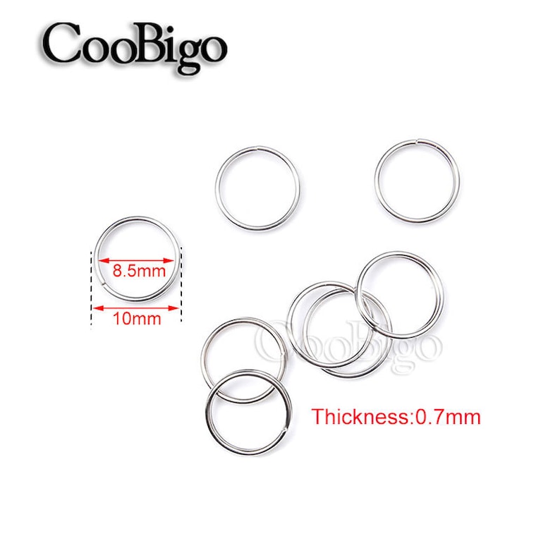 May include: Silver jump rings, 10mm in diameter and 8.5mm in width, with a thickness of 0.7mm. CooBigo is printed on the image.