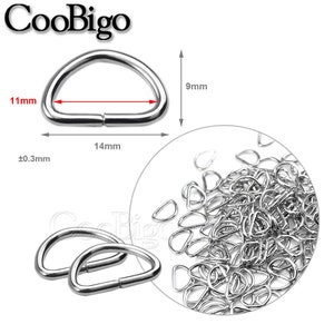 May include: Silver D-ring hardware for crafts and DIY projects. The rings are 14mm long, 9mm wide, and 11mm in diameter. The package includes a bulk quantity of D-rings.