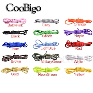 May include: A variety of colors of elastic shoelaces, including baby pink, gray, orange, black, green, purple, blue, light blue, red, brown, military green, white, gold, neon green, and yellow.