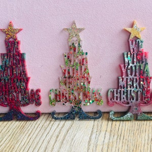 We wish you a merry Christmas resin stand 7” inches tall, green, red, gold, clear resin glitter, sparkle,