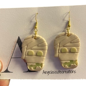 Halloween Frankenstein, mummy glow in the dark dangles. Green white spooky