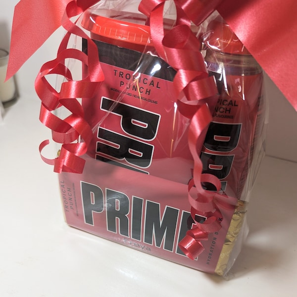 Prime hamper, prime hydration, includes, prime drink, reusable prime cup, prime novelty chocolate bar and prime novelty popcorn,gift wrapped