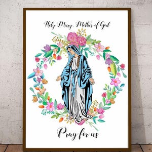May include: A white background with a watercolor illustration of the Virgin Mary in a blue robe standing in a wreath of colorful flowers. The text "Holy Mary, Mother of God" is above the image and "Pray for us" is below the image.