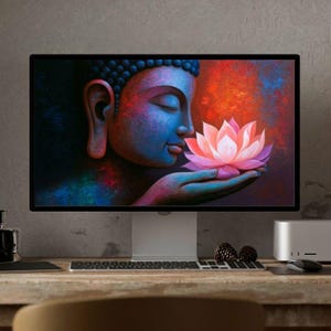 May include: A computer monitor displaying a vibrant digital artwork of a blue-toned Buddha figure with closed eyes, holding a large, glowing pink lotus flower in cupped hands against a textured background of swirling red, orange, and blue colors.