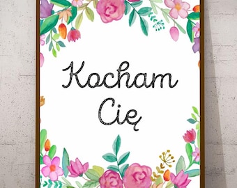 May include: A framed print with a white background and a floral border. The text "Koch am Cie" is written in black cursive script.
