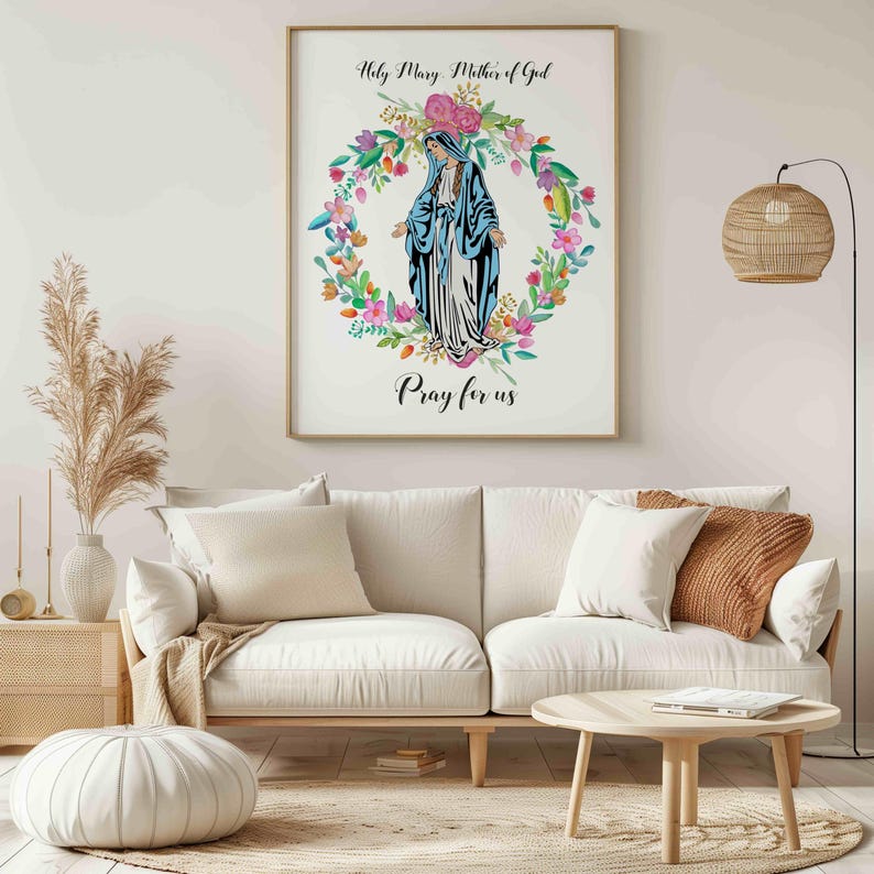 May include: A white framed print with a watercolor illustration of the Virgin Mary surrounded by a wreath of flowers. The text "Holy Mary Mother of God" and "Pray for us" is printed below the image.