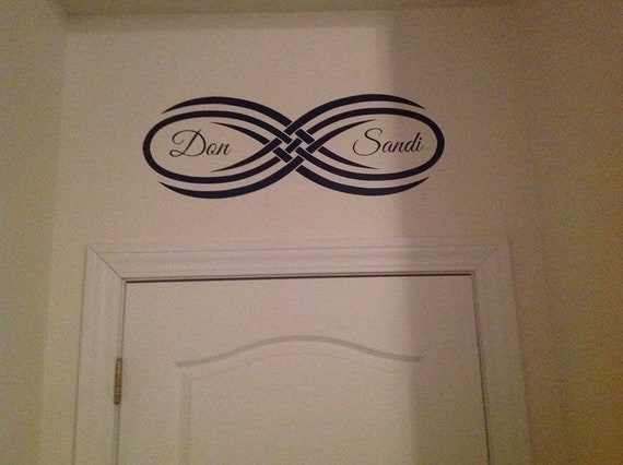 Personalize your love for one another with this vinyl wall decal.