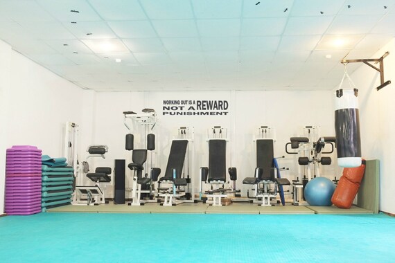 Fitness Wall Decal – 'Working Out is a Reward' Vinyl Quote (Matte Finish)