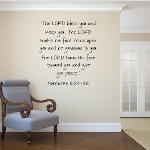 May include: A beige wall with a black and white inspirational quote from the Bible, Numbers 6:24-26, "The LORD bless you and keep you; the LORD make his face shine upon you and be gracious to you; the LORD turn His face toward you and give you peace."
