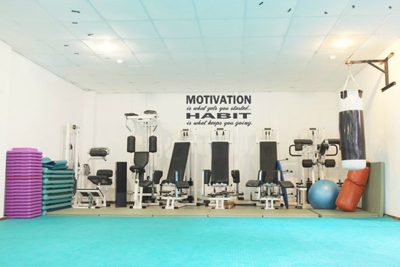 Motivation is what gets you started. Habit is what keeps you going. Interior vinyl wall decal.