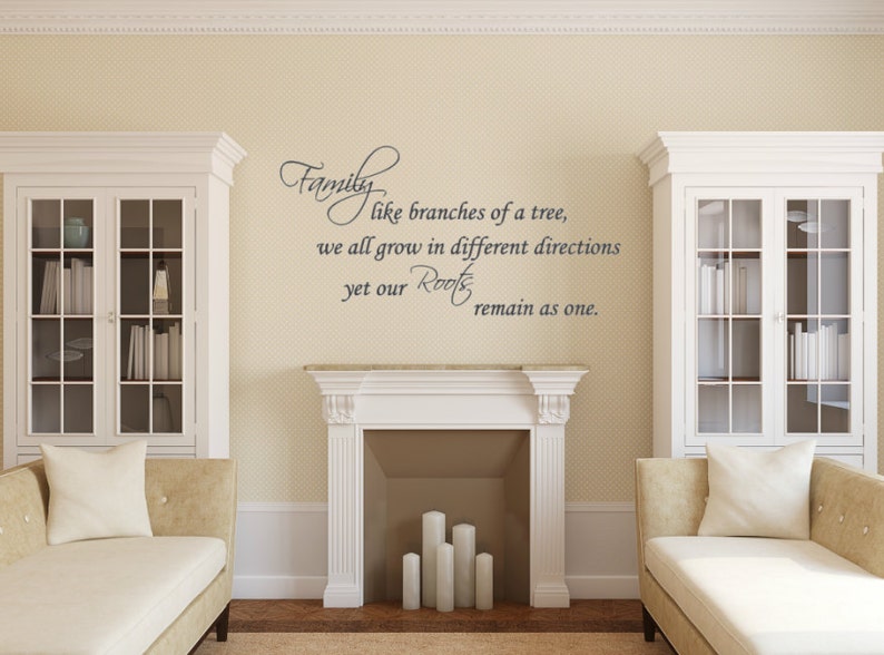 May include: A white wall with a gray vinyl decal that reads "Family like branches of a tree, we all grow in different directions yet our Roots remain as one."