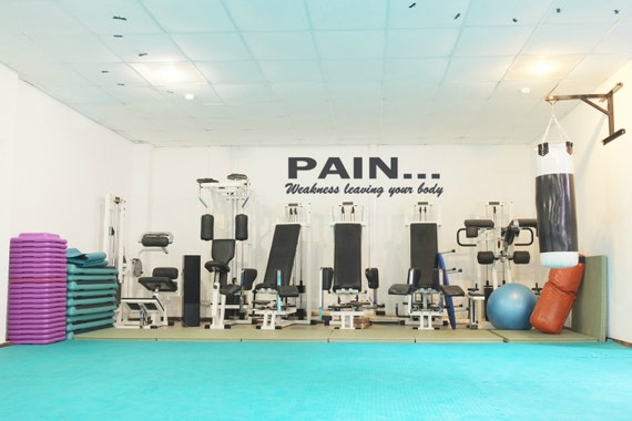 Pain... weakness leaving your body. Motivational wall decal. Fitness Decal. Gym Decal.