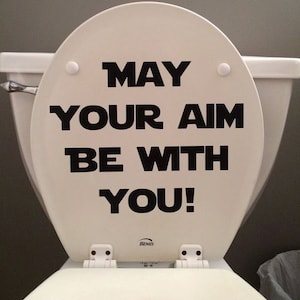 May your aim be with you!  - toilet seat or bathroom wall decal.