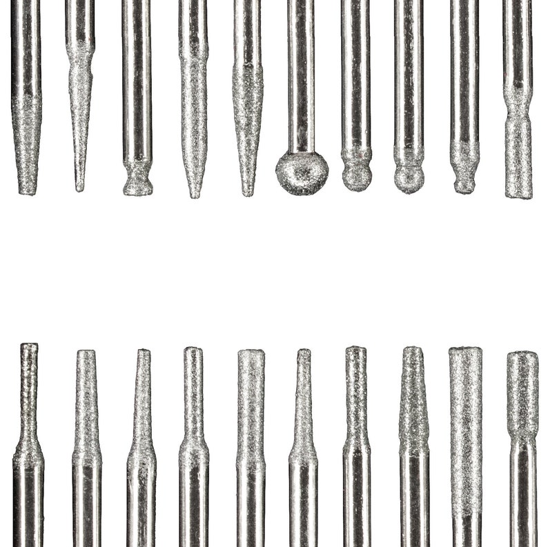 May include: A set of 20 silver-colored diamond-tipped drill bits for use with a rotary tool. The bits are arranged in two rows of ten, with the tips facing the viewer.