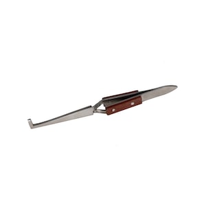May include: A pair of stainless steel tweezers with a bent tip and wooden handles. The tweezers are designed for precision work.