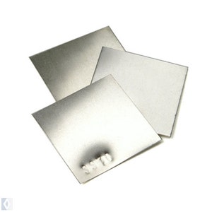 May include: Three silver squares of metal, one with the text "3571" stamped on it.